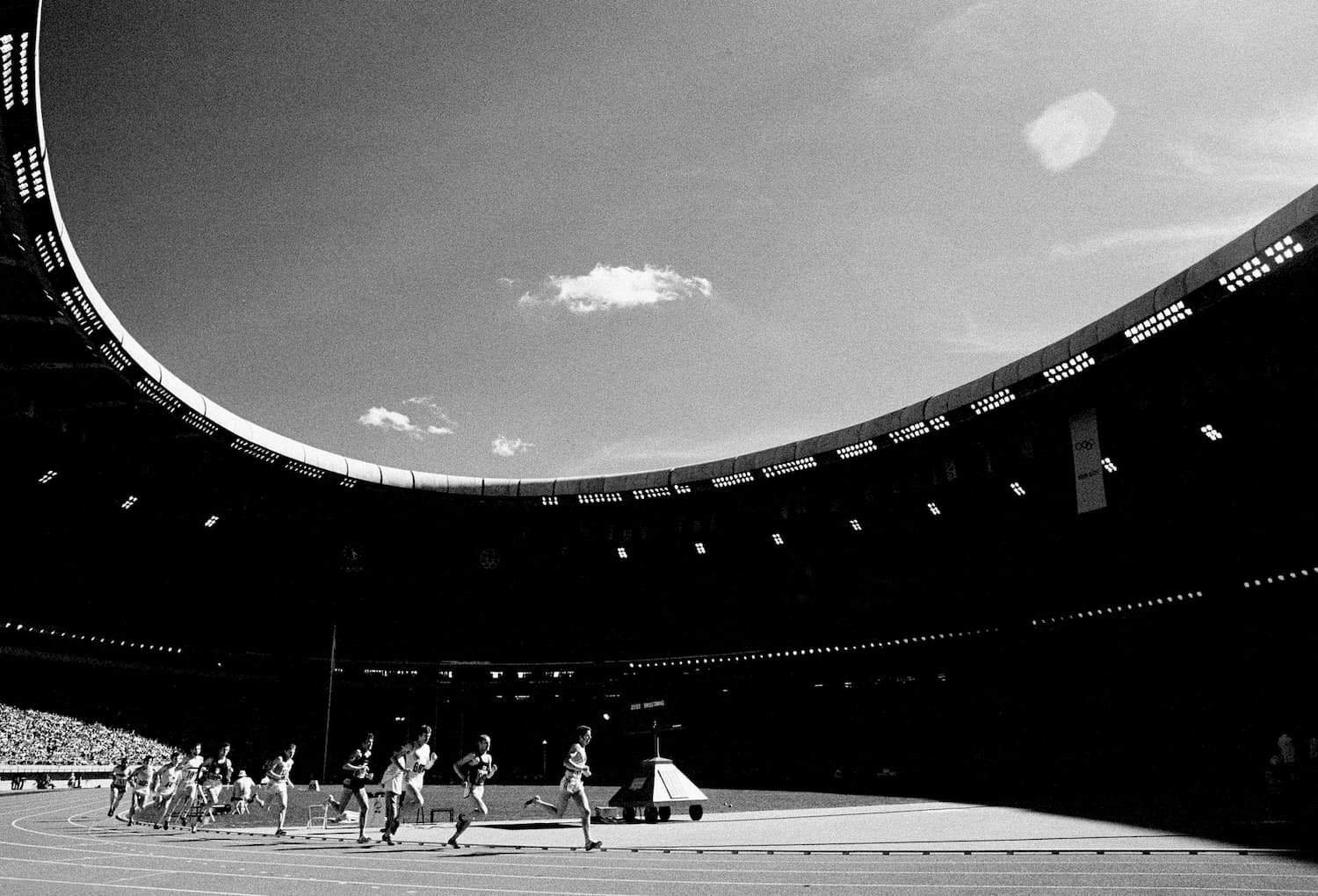Brendan Foster leading the 5000m at Montreal Olympics - sports photograph by Chris Smith