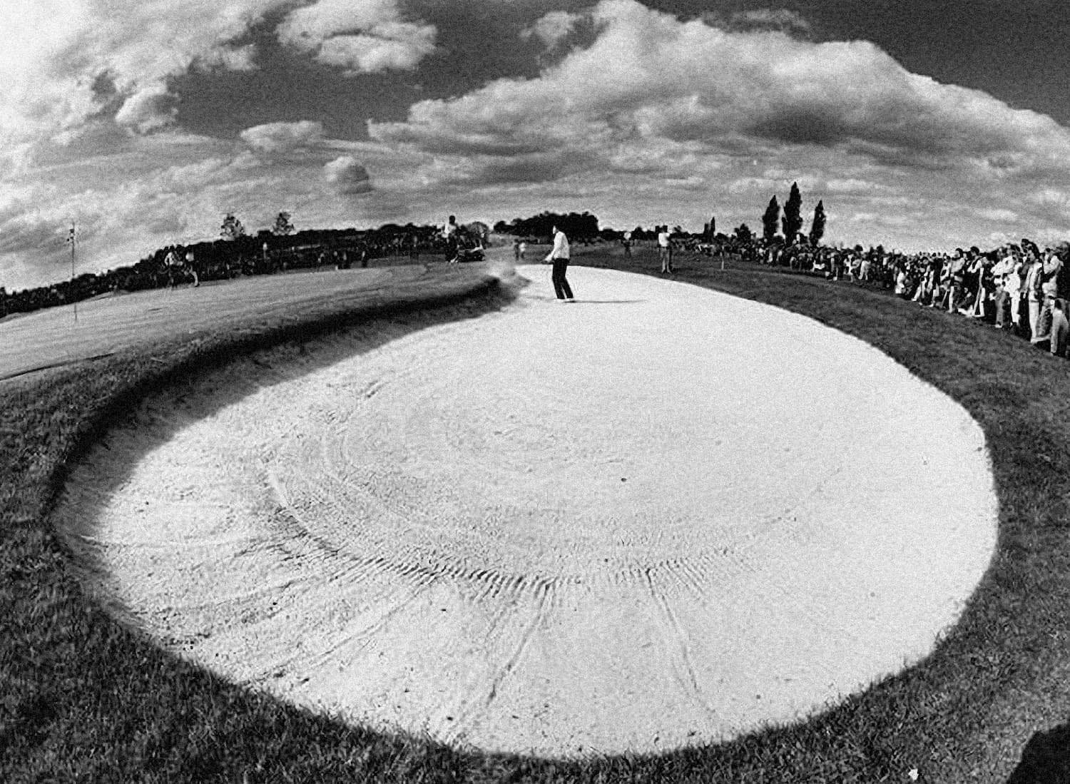 Golfer in bunker - sports photograph by Chris Smith