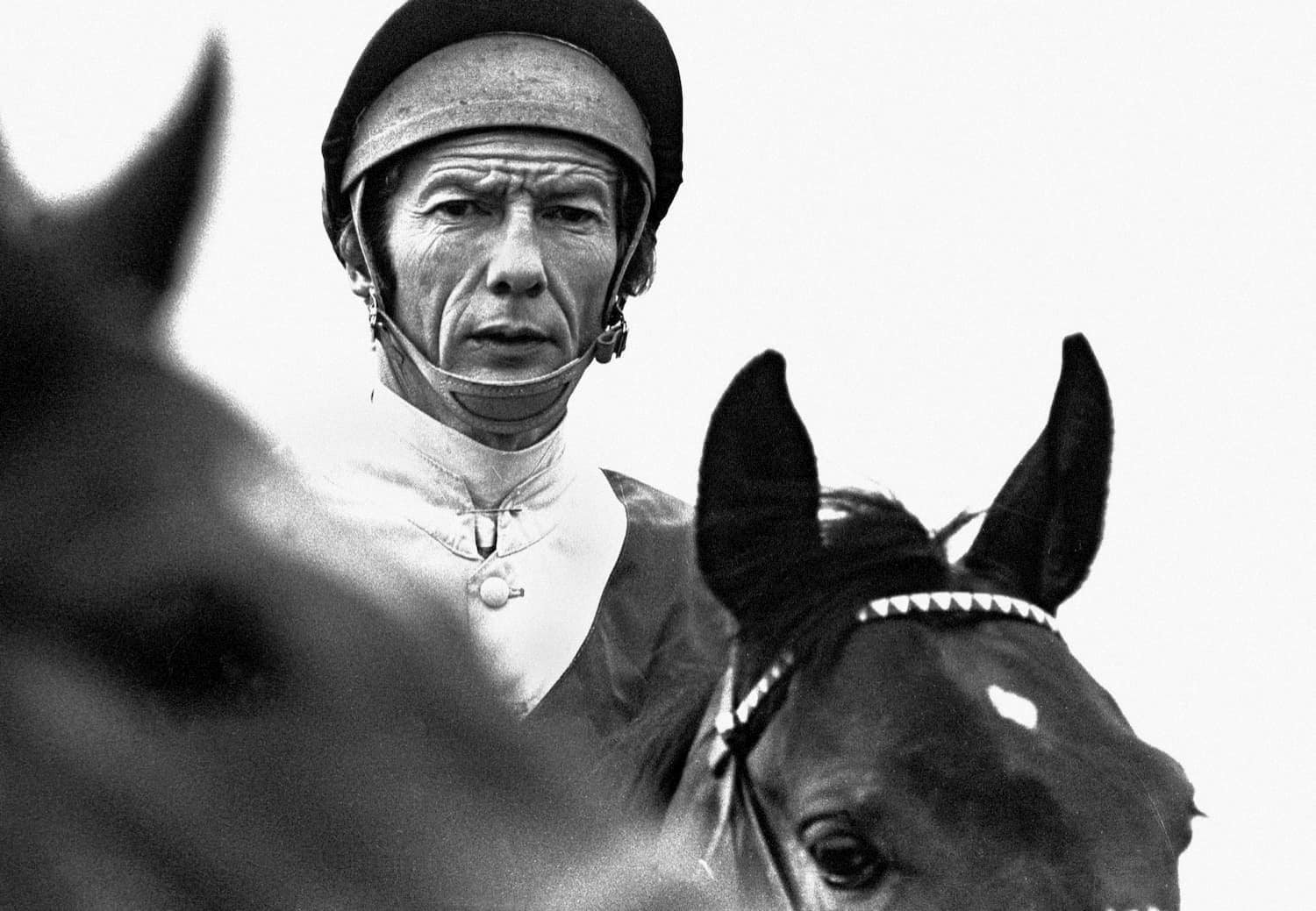 Jockey Lester Piggott portrait - black and white sports photograph by Chris Smith
