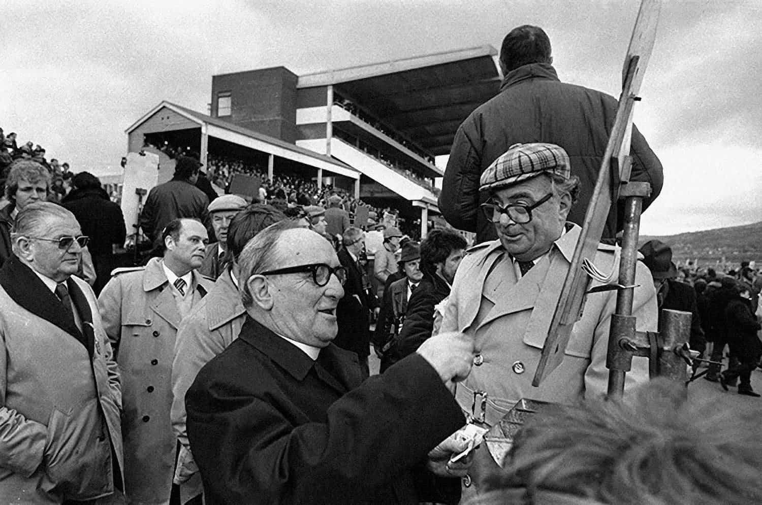 Betting at Cheltenham races 1984 - sports photograph by Chris Smith