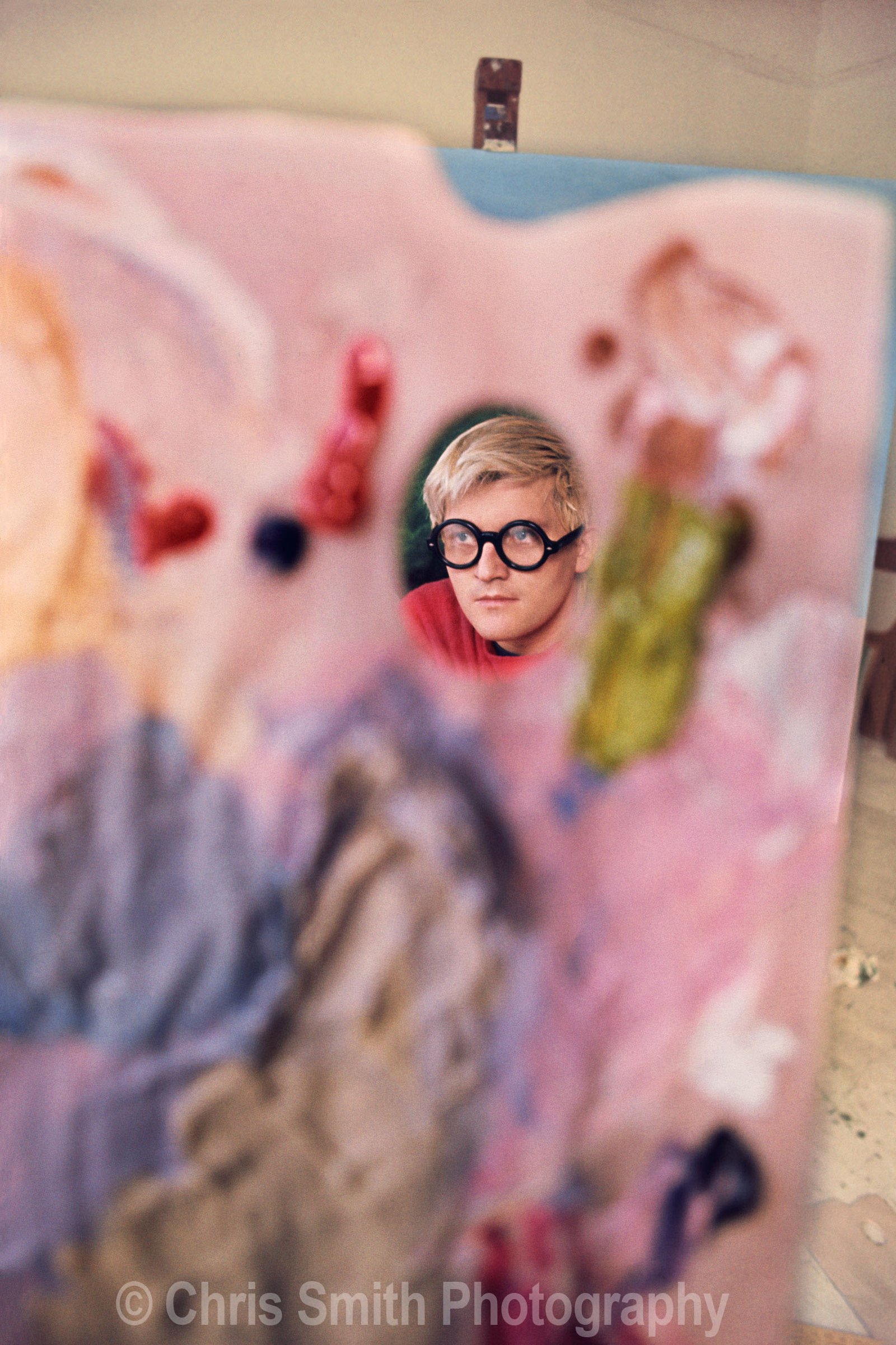 David Hockney with paint palette in Kensington studio 1968 Chris Smith photograph