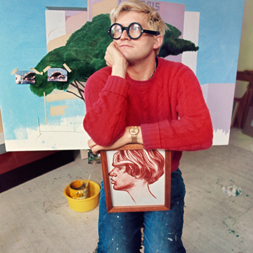 n9_hockney-sitting-on-stool-with-painting-New-copy